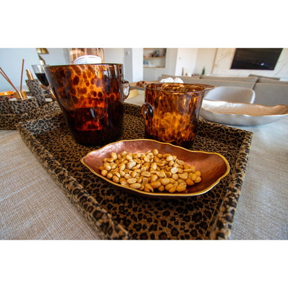 Decorative brown glass oval bowl with subtle golden edge detail