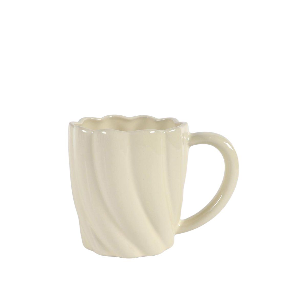 White ceramic mug with a scalloped edge on a white background