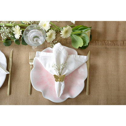 Pink melamine plate featuring a delicate floral pattern