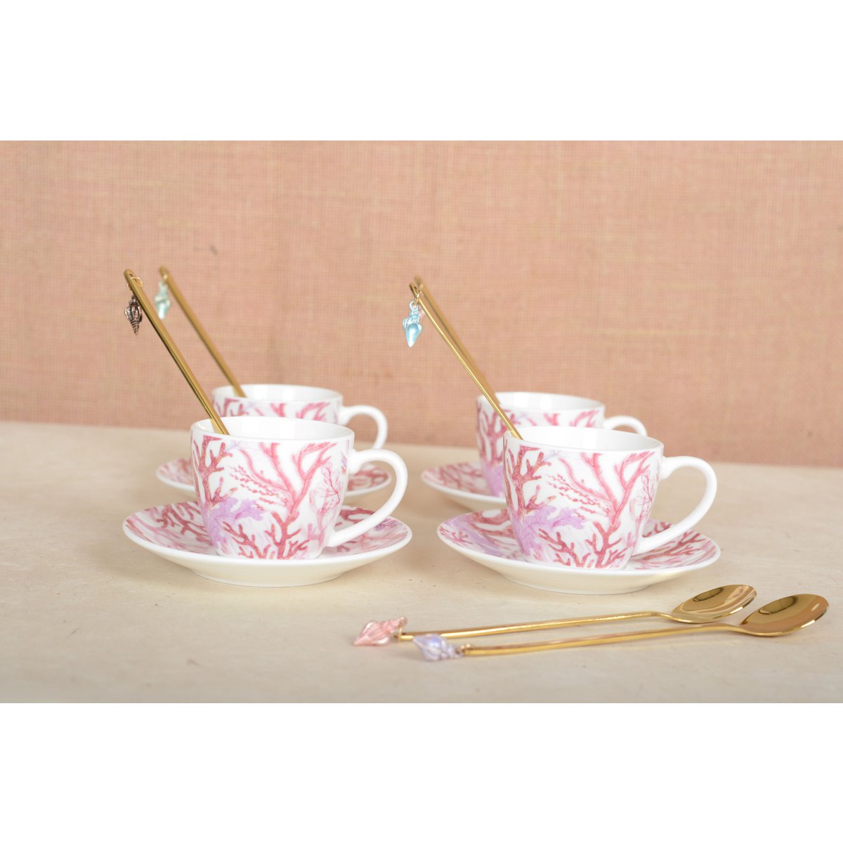 Elegant coral-themed coffee cups and saucers, ideal for home decoration and tableware | CozyVibe

