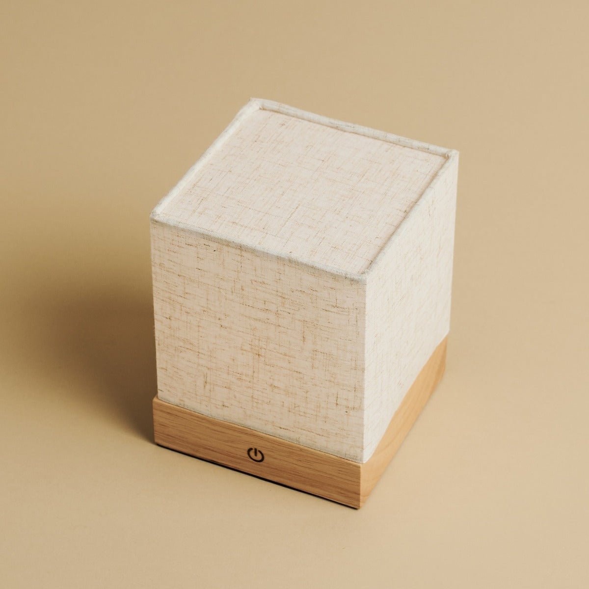 Portable minimalist lamp in wood and linen, wireless design